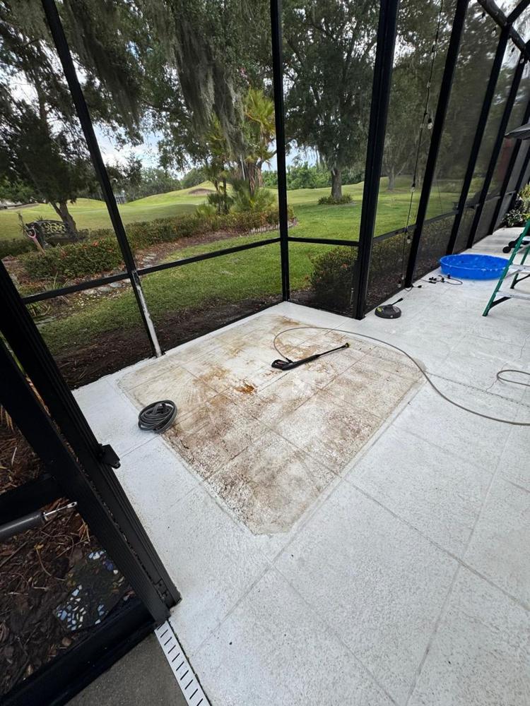 Screened lanai cleared after a hot tub was removed